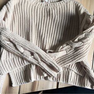 Candie’s light pink sweater